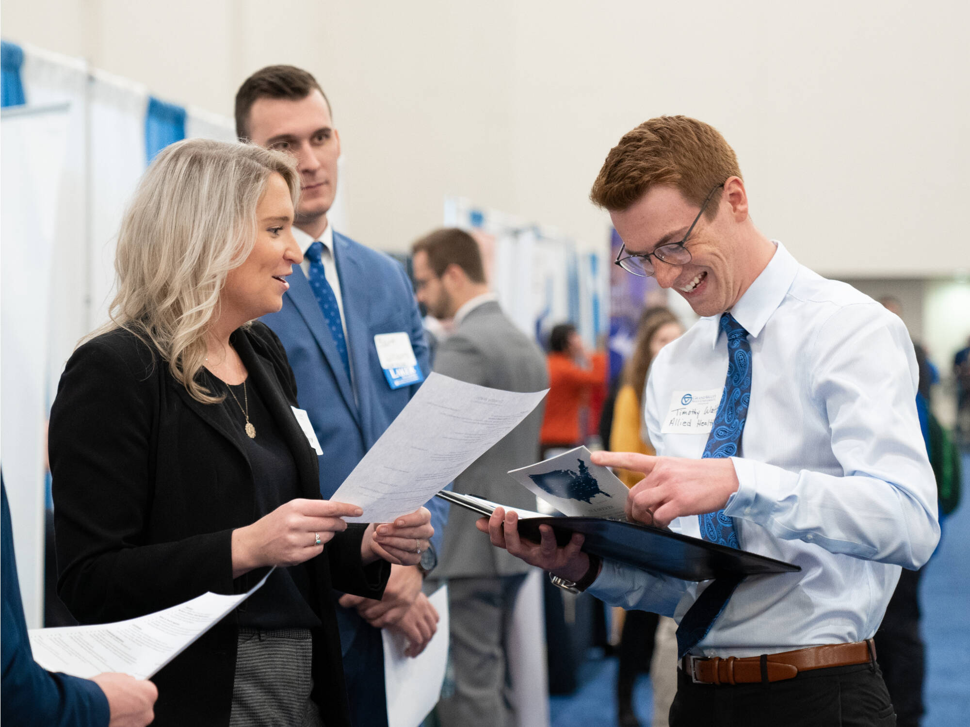 two people networking at the career fair